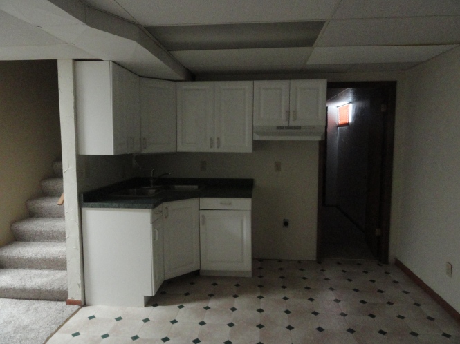 stucco house basement kitchen